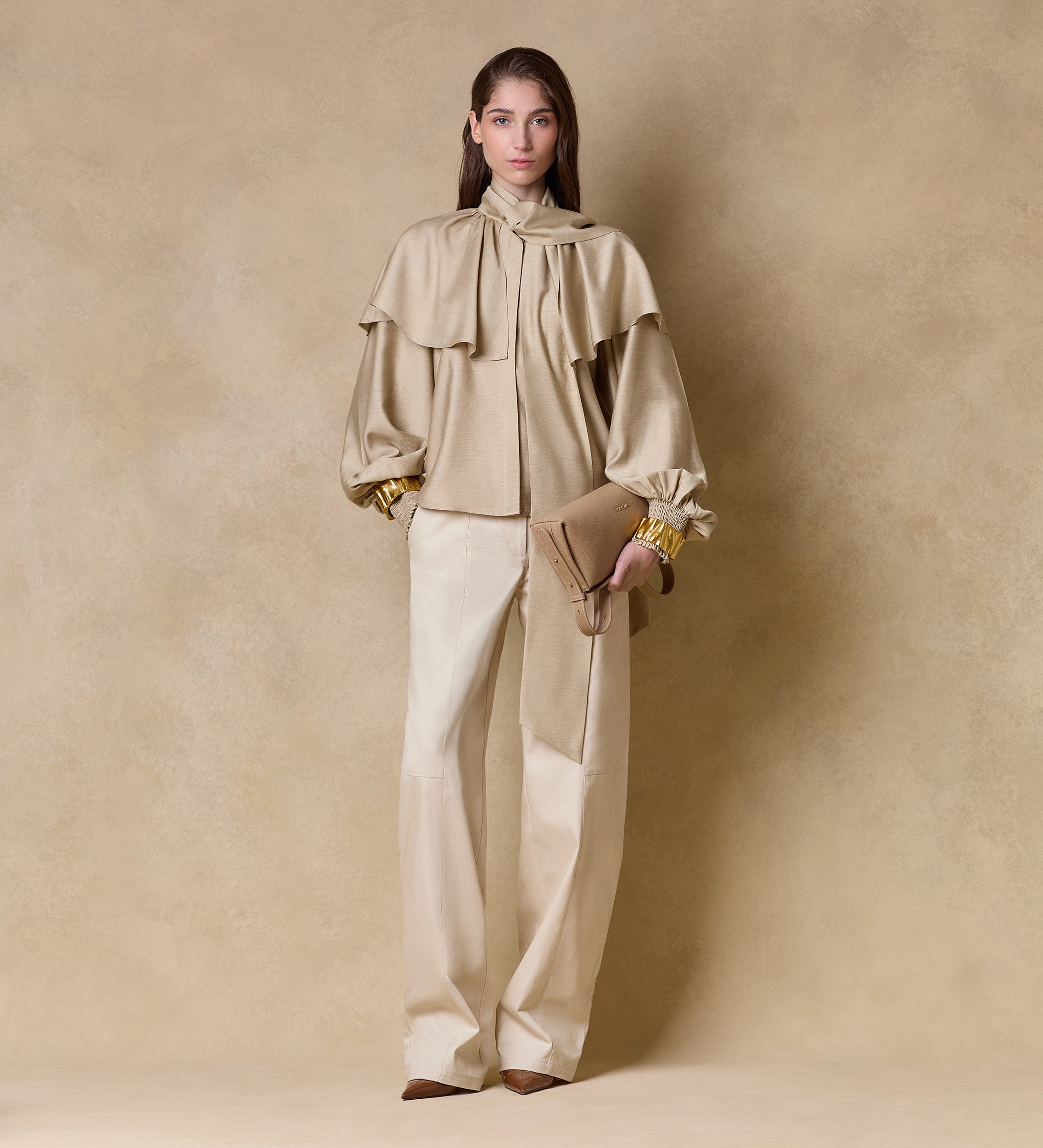 Blusa capa manga abullonada